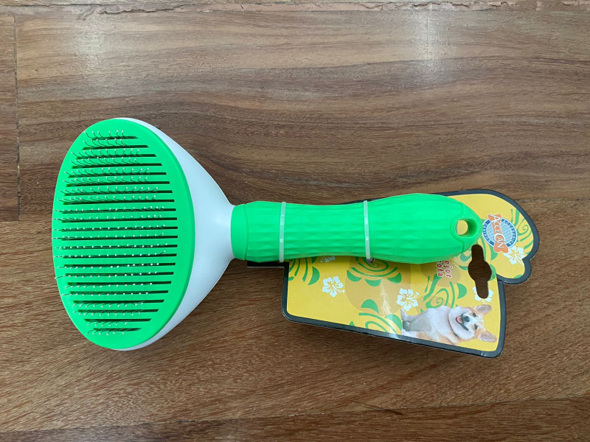 Cepillo con botón extractor de pelo-1